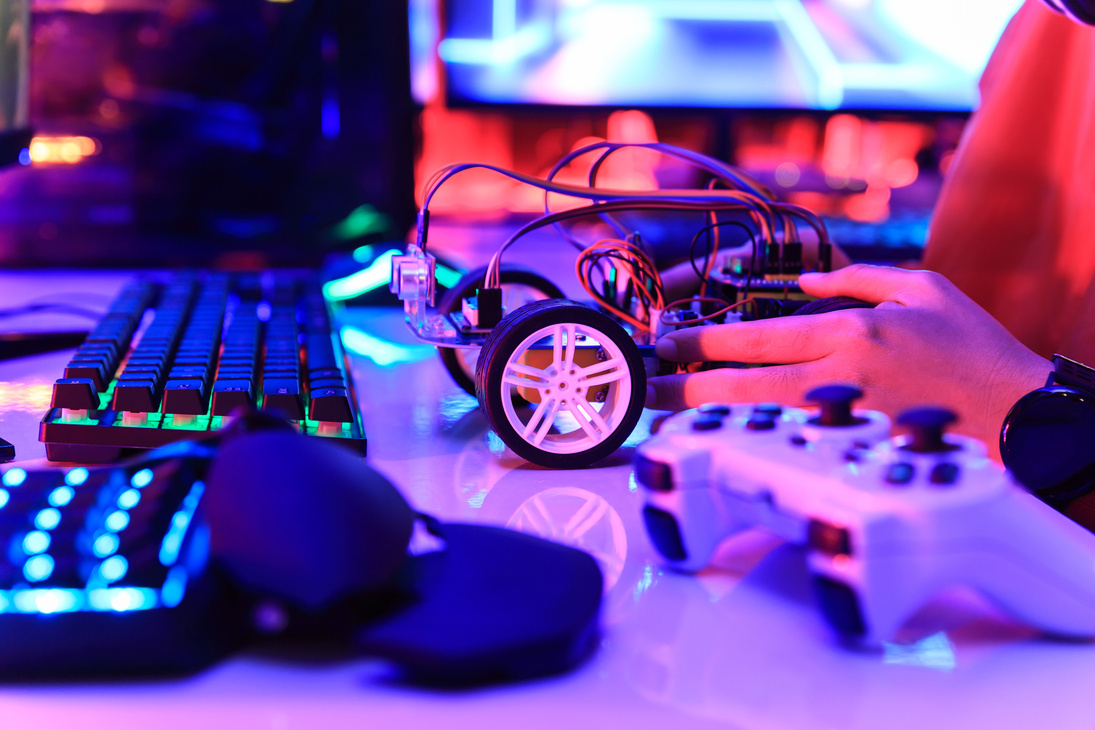 Teenager plugging energy and signal cable to sensor